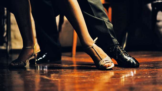 Tango dancers feet on the dancefloor
