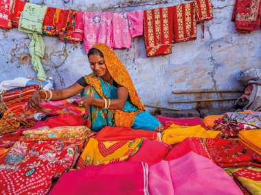 Woman selling fabrics, Rajasthan, Northern India