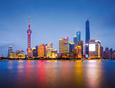 Shanghai City Skyline On The Huangpu River, China