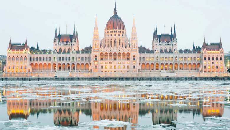 Hungarian Parliament Building At Winter Ice Drift On Danube River, Budapest, Hungary