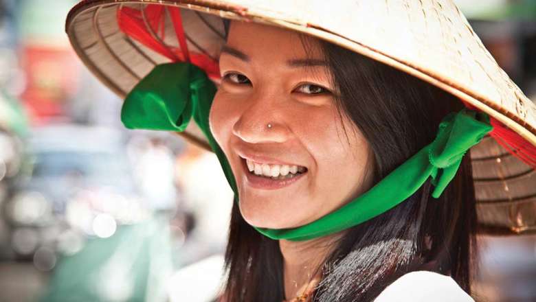 Woman wearing a traditional vietnamese hat, Vietnam