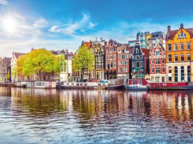  Dancing Houses Over River Amstel Landmark, Amsterdam, Netherlands