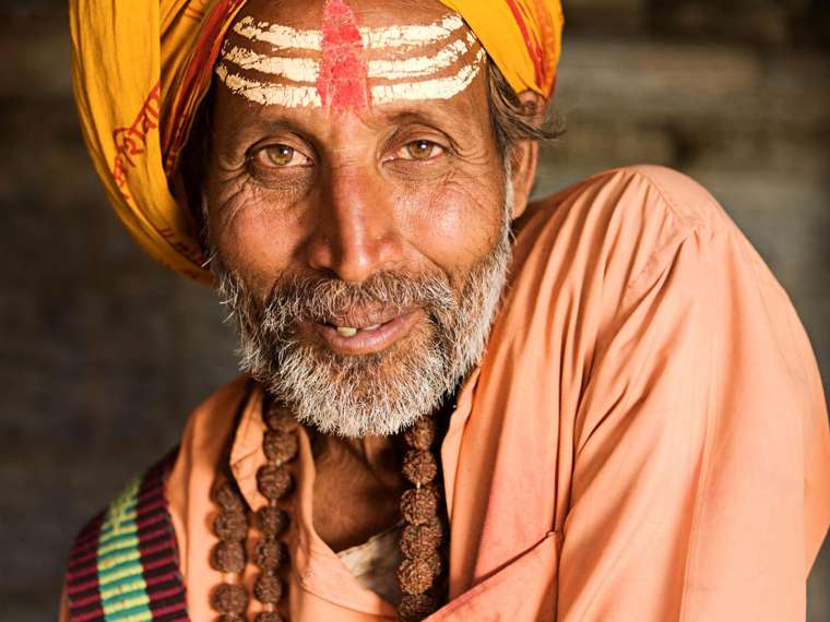 Indian Holyman Sitting In The Temple India Istock 175235384
