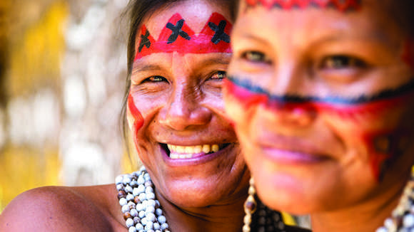 Native Brazilian Women Smiling At An Indigenous Tribe In The Amazon, Brazil