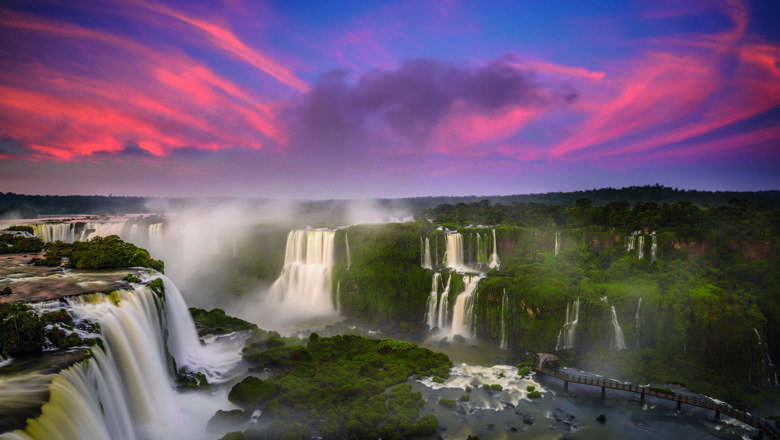 Red Clouds And Full Moon During The Sunrise At Iguassu Falls, Brazil