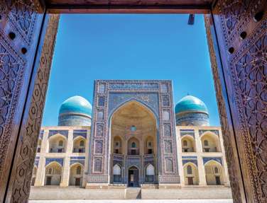 View To Mir I Arab Madrassa Thru The Old Wooden Carved Door, Bukhara, Uzbekistan 