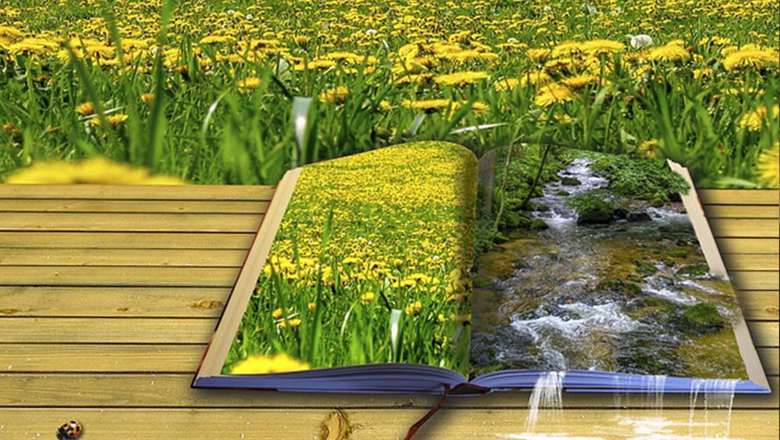 Imaginative image of an open book with fields and a running waterfall over the edge